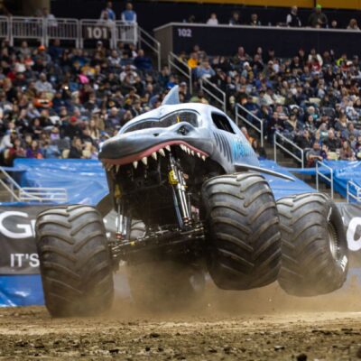 A Monster Jam truck in the dirt.