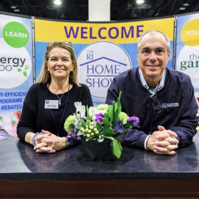 People at home show welcome booth.