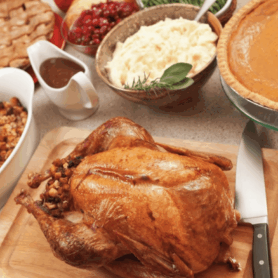 Thanksgiving food on a cutting board.