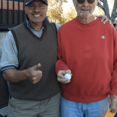 Two men posing for a picture.