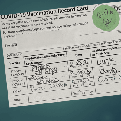 Covid-19 vaccination record card.