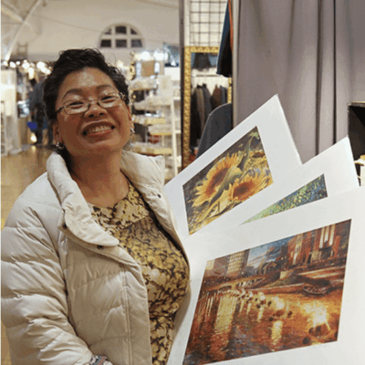 A woman wearing a white jacket.