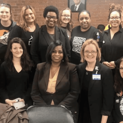 A group of women posing for a photo.