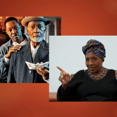 A black man and a woman with a turban on a red background.