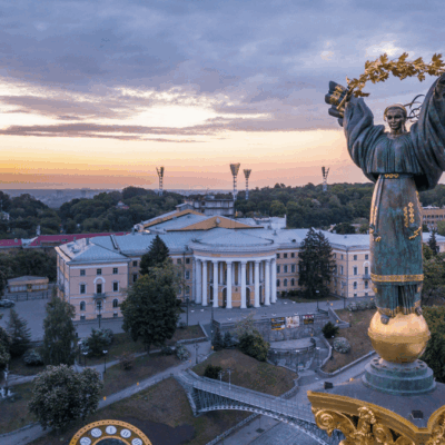 A statue of an angel on top of a building.