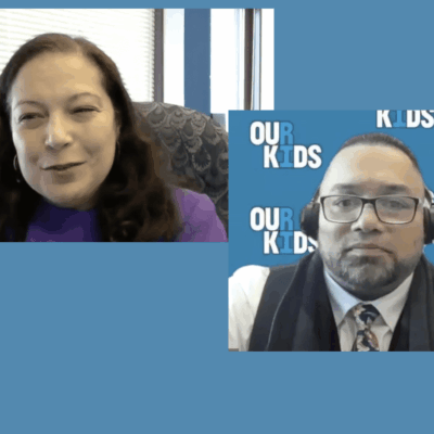 A man and a woman talking on a video.