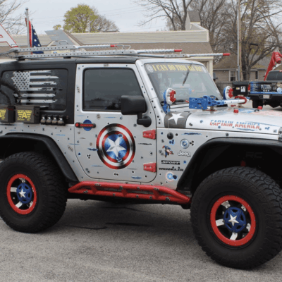 A jeep parked in a parking lot.