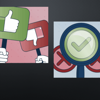 A picture of a hand holding a thumbs up and a thumbs down sign.