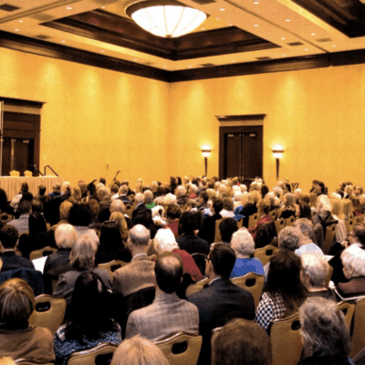 A large group of people in a room.