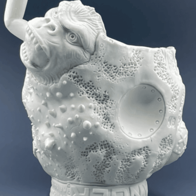 An image of a gorilla with a pipe.