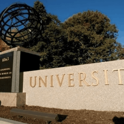 A sign with the word montana university in front of it.