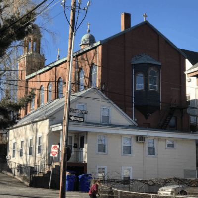 A brick building on a street.
