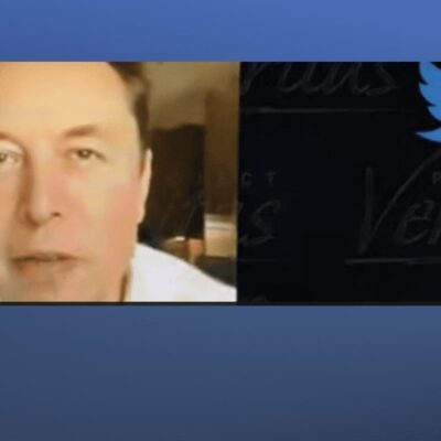 A man's face is shown on a twitter screen.