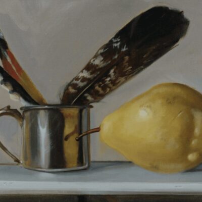 A pear and a feather in a cup.