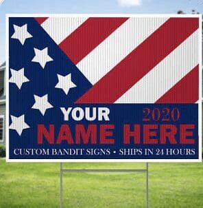 A yard sign with an american flag and your name on it.