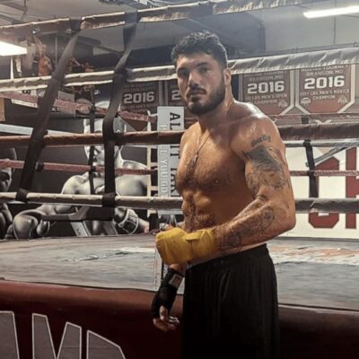 A man standing in a boxing ring.