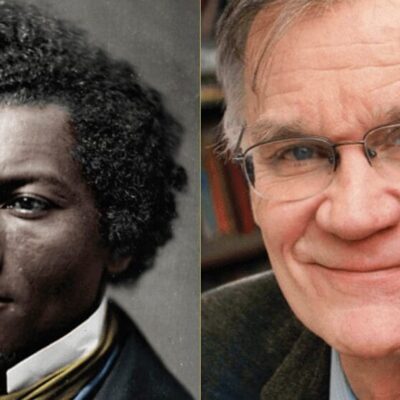 A black man with glasses and a man with afro hair.