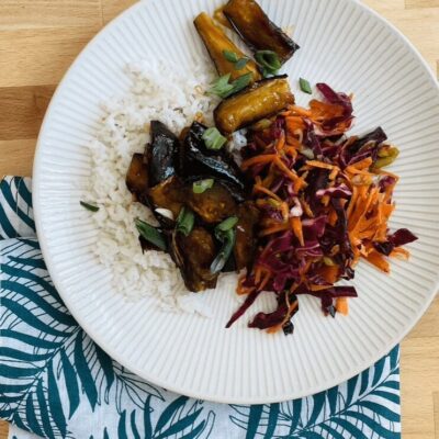 A plate with rice and vegetables on it.