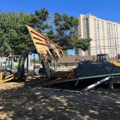 The roof of a house has been torn down.