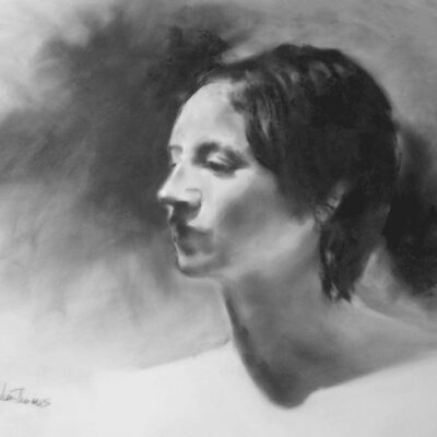A black and white drawing of a woman in profile.