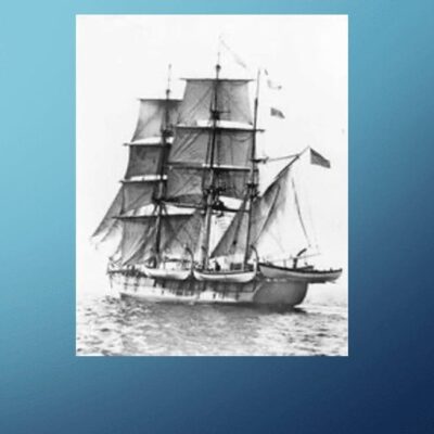 A black and white photo of a tall ship.
