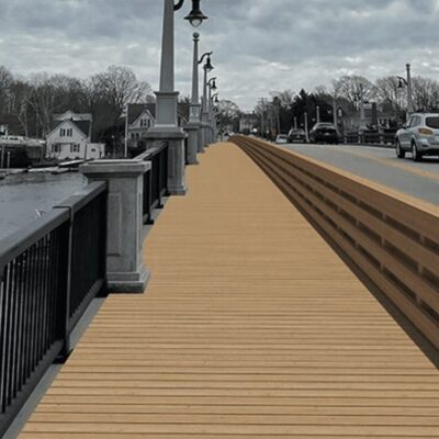 An artist's rendering of a bridge over a river.