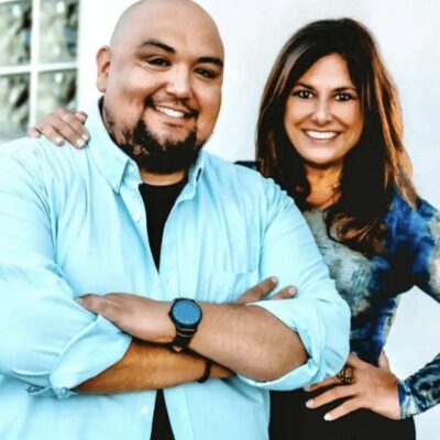 A man and woman posing for a photo.