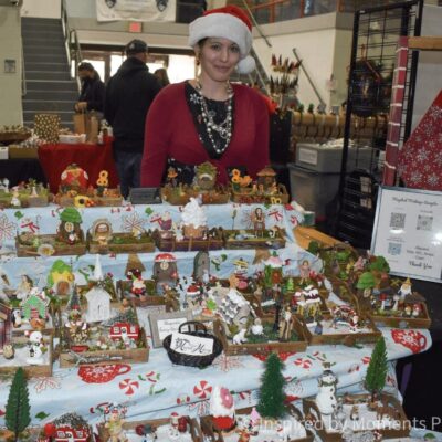 A woman wearing a santa hat.