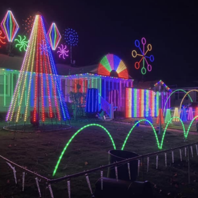 A house decorated with christmas lights.