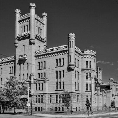 A black and white photo of an ornate building.