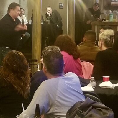 A man giving a presentation to a group of people.