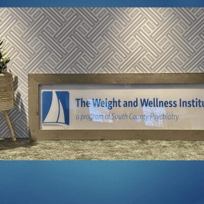 The weight and wellness institute logo.