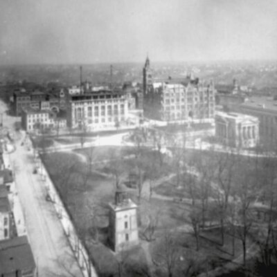 An old black and white photo of a city.