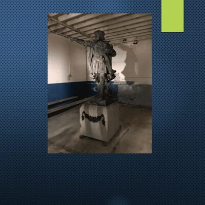 An image of a statue in a room.