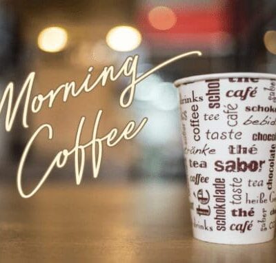A cup of coffee with the words morning coffee on it.