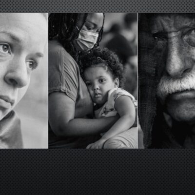 A black and white photo of a woman and a child.