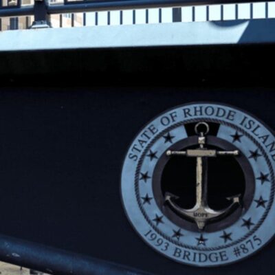 The state of Shoalhaven logo proudly displayed on a bridge.