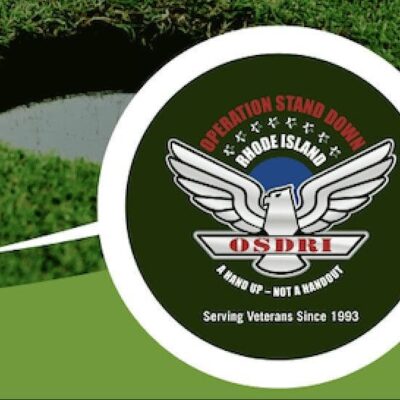 A logo with an eagle and a hole in the grass.