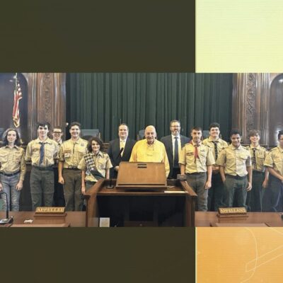 A group of scouts posing for a picture.
