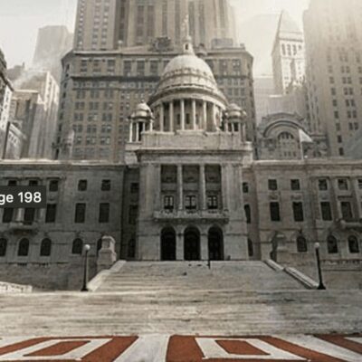 An image of a city with a large building in the background.