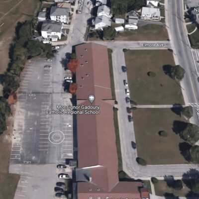 An aerial view of a parking lot and a building in Rhode Island.