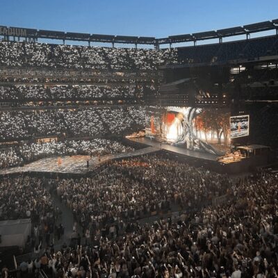 A stadium full of people watching a Taylor Swift concert.