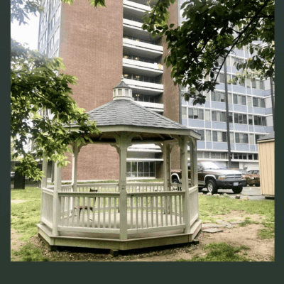 A gazebo in front of an apartment building that provides shelter for the homeless in Rhode Island.