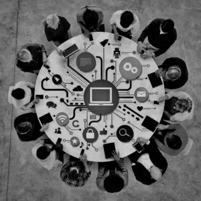 Michael Morse sitting at a table with a group of people.