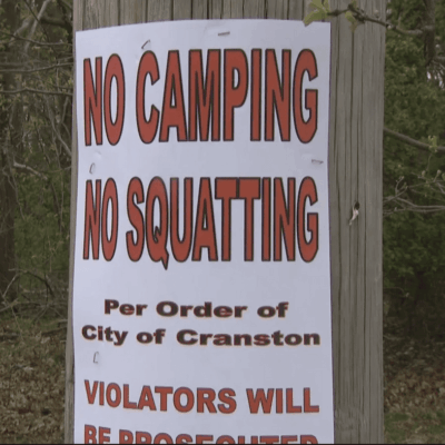 No camping or squatting allowed per order of City of Cranston, addressing the issue of homelessness.