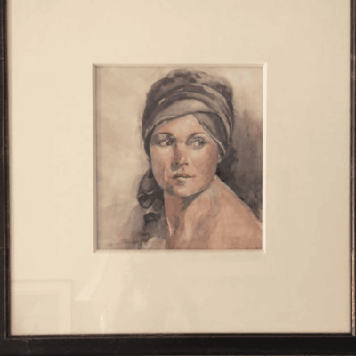 A portrait of a woman in a framed frame.