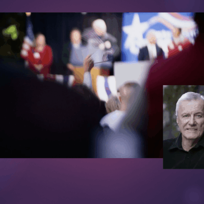 Jack Partridge is standing in front of a crowd of people.