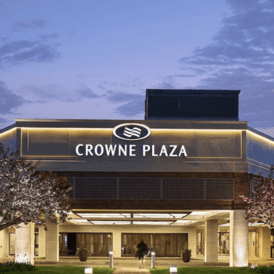 Networking at Crowne Plaza during dusk.