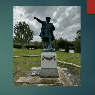 A Columbus statue in a park.