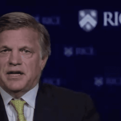 An image of Joe Paolino Jr. in a suit and tie.